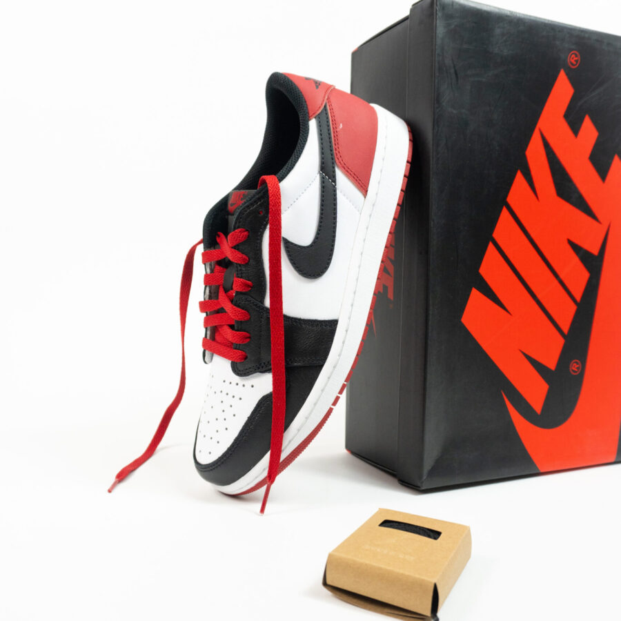 JORDAN 1 LOW BLACK TOE